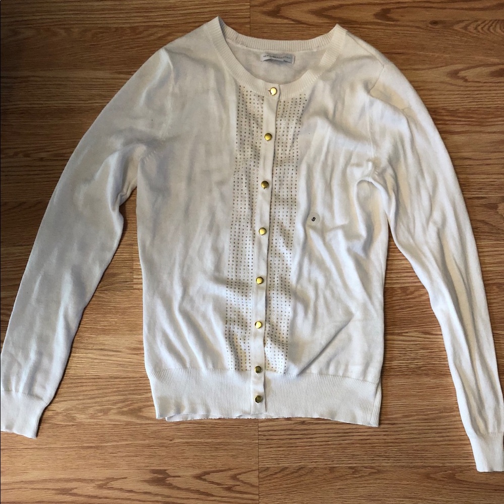 White cardigan with gold details